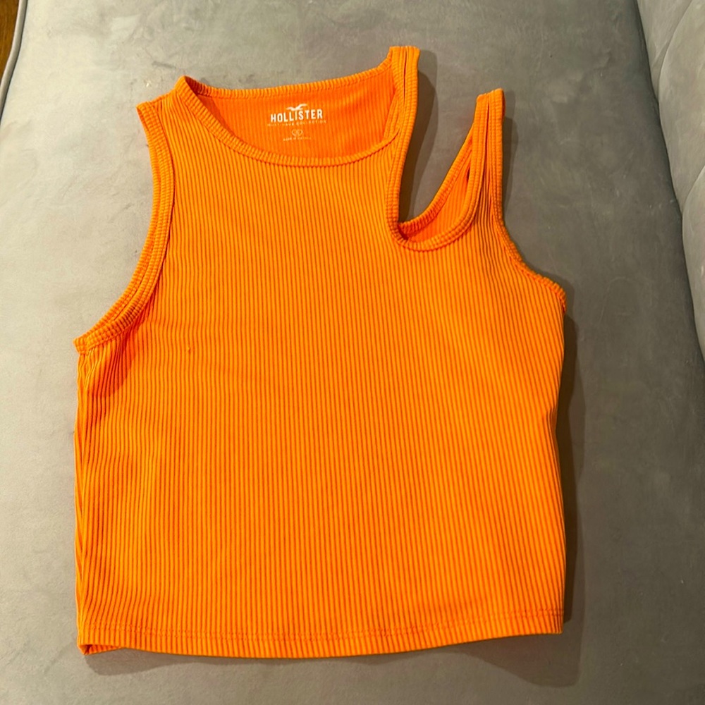 Hollister ribbed orange cut out tank (size small fits like a medium though)